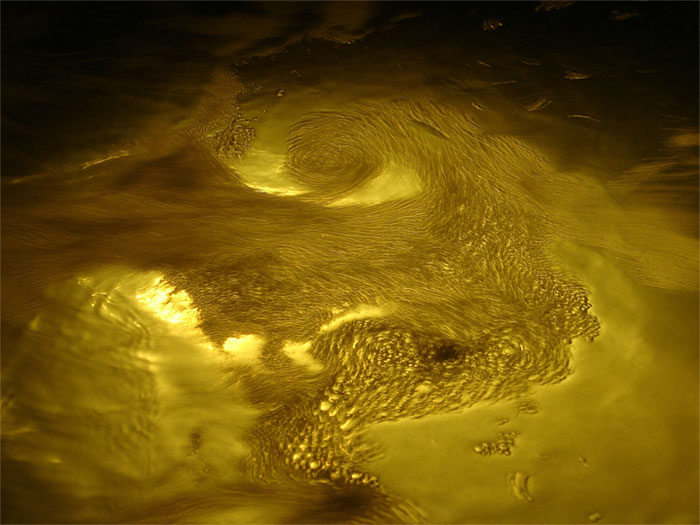 yellow_churning_gold_water_ Gold Texture Examples: 30 Golden Backgrounds