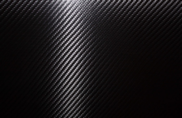 Carbon-fiber-HD-image-700x455 Carbon Fiber Texture Examples to Use As Background For Your Designs