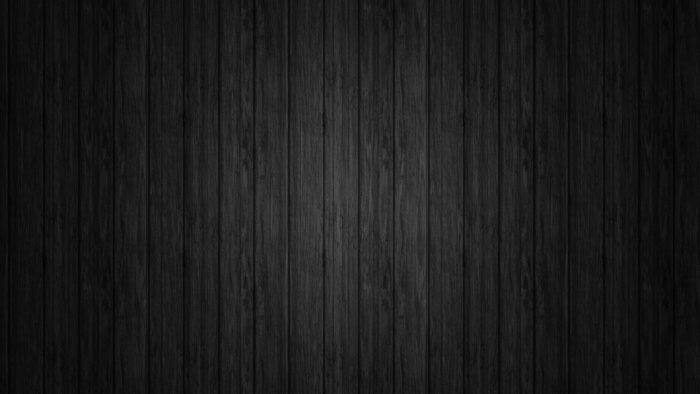 1073233-black-wood-panels-700x394 Wood background textures that you can add in your designs