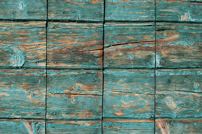 photo-1477058267562-6f70f44-700x465 Wood background textures that you can add in your designs