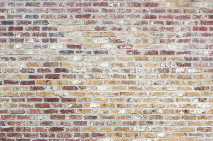 multicolor-brick-wall-700x466 Brick wall background textures that you can use in your designs