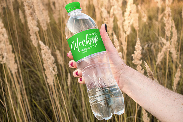 Free-Water-Bottle-Mockup-700x467 Download a water bottle mockup from these templates