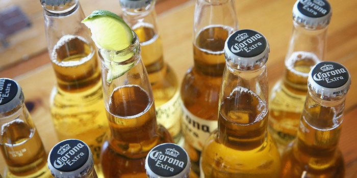 Everybodys-Welcome Sippin' on Sunshine: Corona Ads' Positive Messaging Strategy