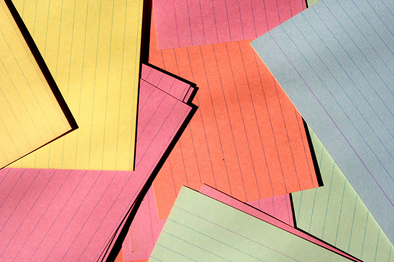 colorful-index-cards-scattered-on-desk-texture The most colorful wallpaper examples you can download today