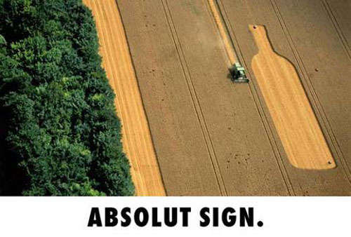 signs Absolut Vodka Ads to Check Out